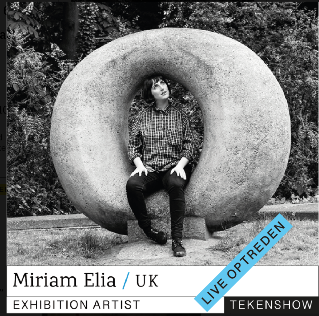 Miriam Elia sitting in a sculpture